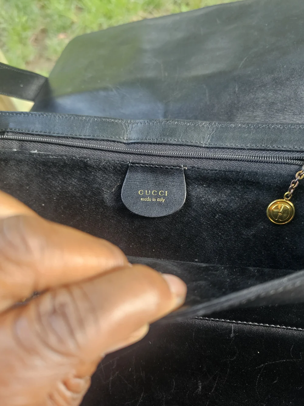 Black Leather Shoulder Bag with Gold Accent